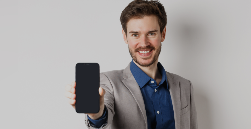 Our expert holding a phone